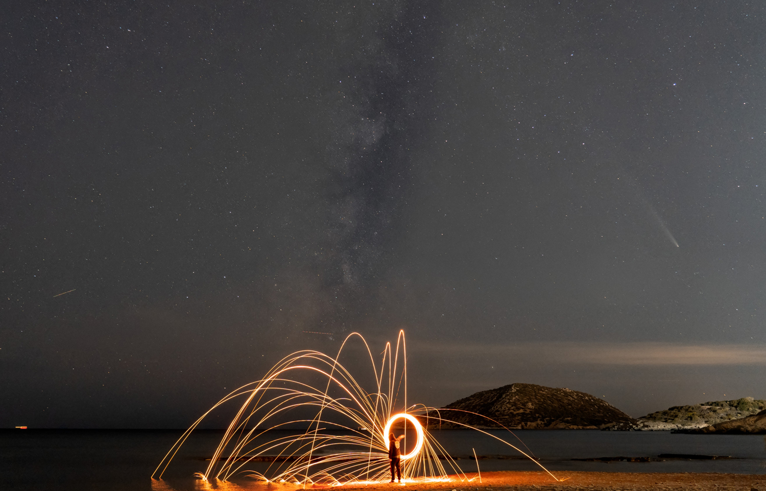 Night milky way comet